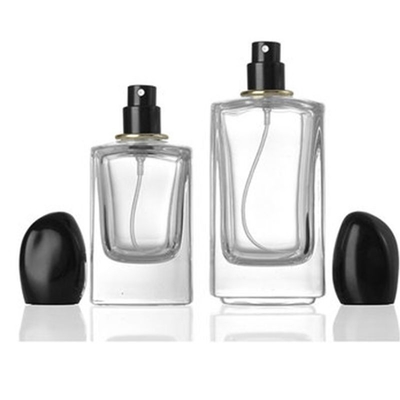 Quadratische Glasflasche mit 50 ml 100 ml Fassungsvermögen und markant unregelmäßig geformter Kappe