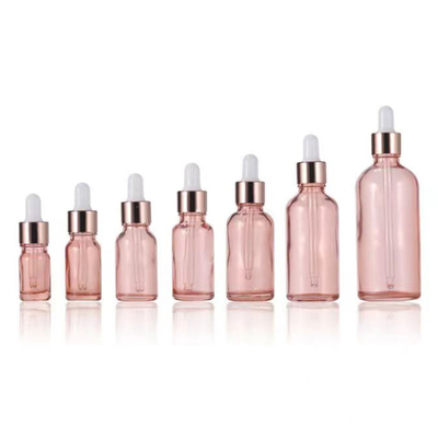 Großhandel rosa Glas Essential Flasche mit goldenen Aluminium Tropfkappe